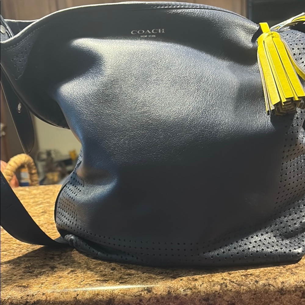 New coach bag with yell ow tassel brand
New nwot